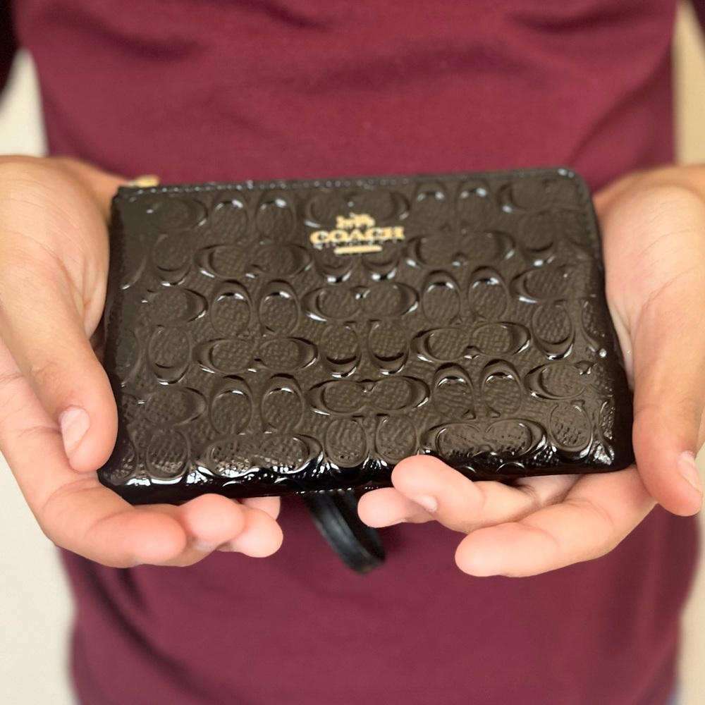 Small Coach clutch wallet. EUC. Black Patton leather.